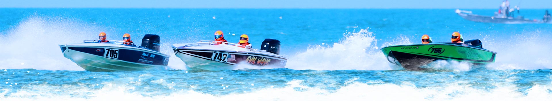 three boats racing in the 2019 OPA World Championships