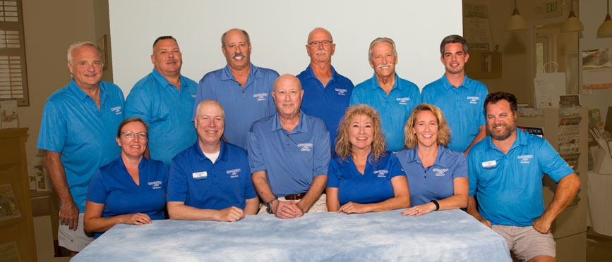 board group photo of 9 men and 3 women