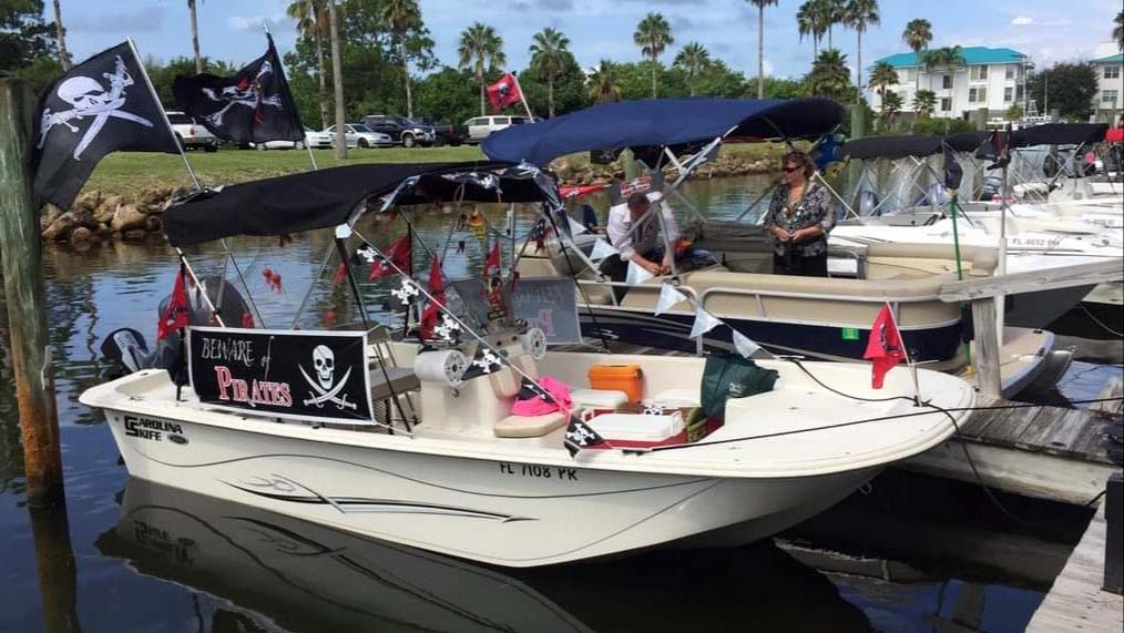 Boat with Pirate Poker Run banner